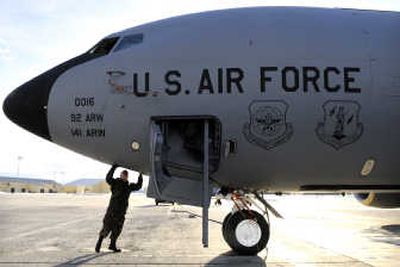 Tech. Sgt. David Carney checks a 50-year-old KC-135 at Fairchild Air Force Base in February. 
 (File / The Spokesman-Review)
