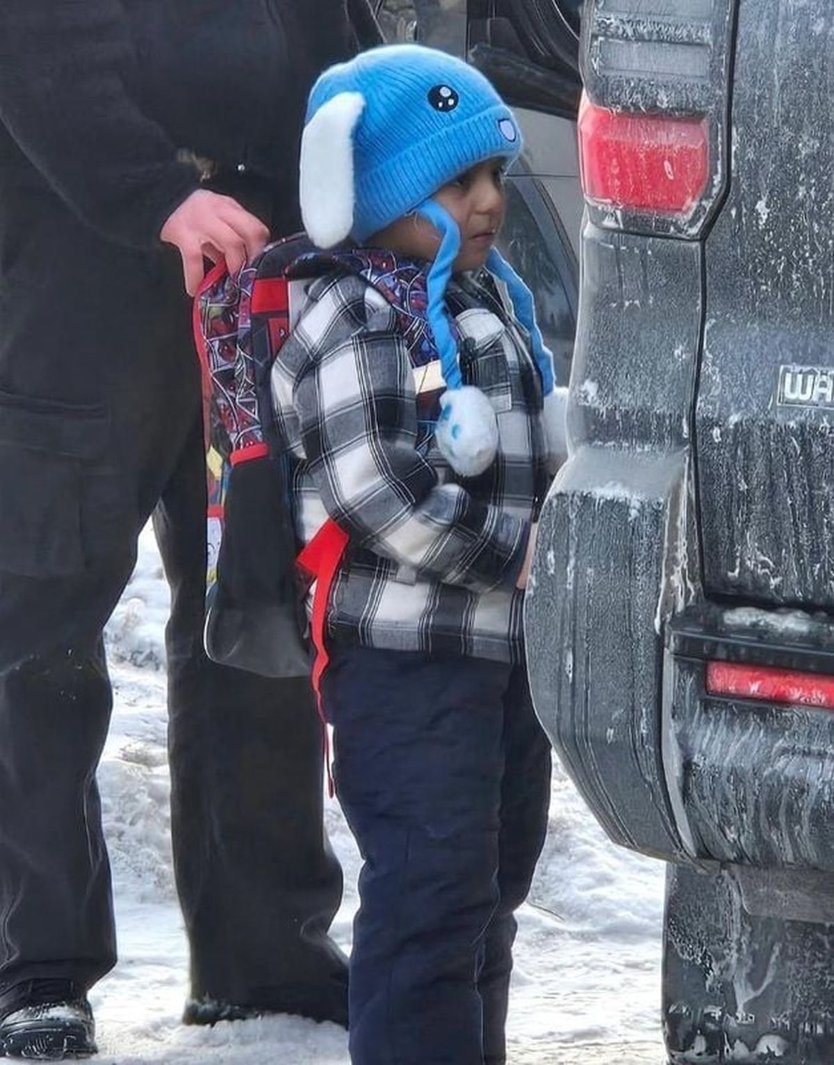 A photo showing 5-year-old Liam Ramos being detained by a federal immigration agent in Minnesota.  (Columbia Heights Public School D)