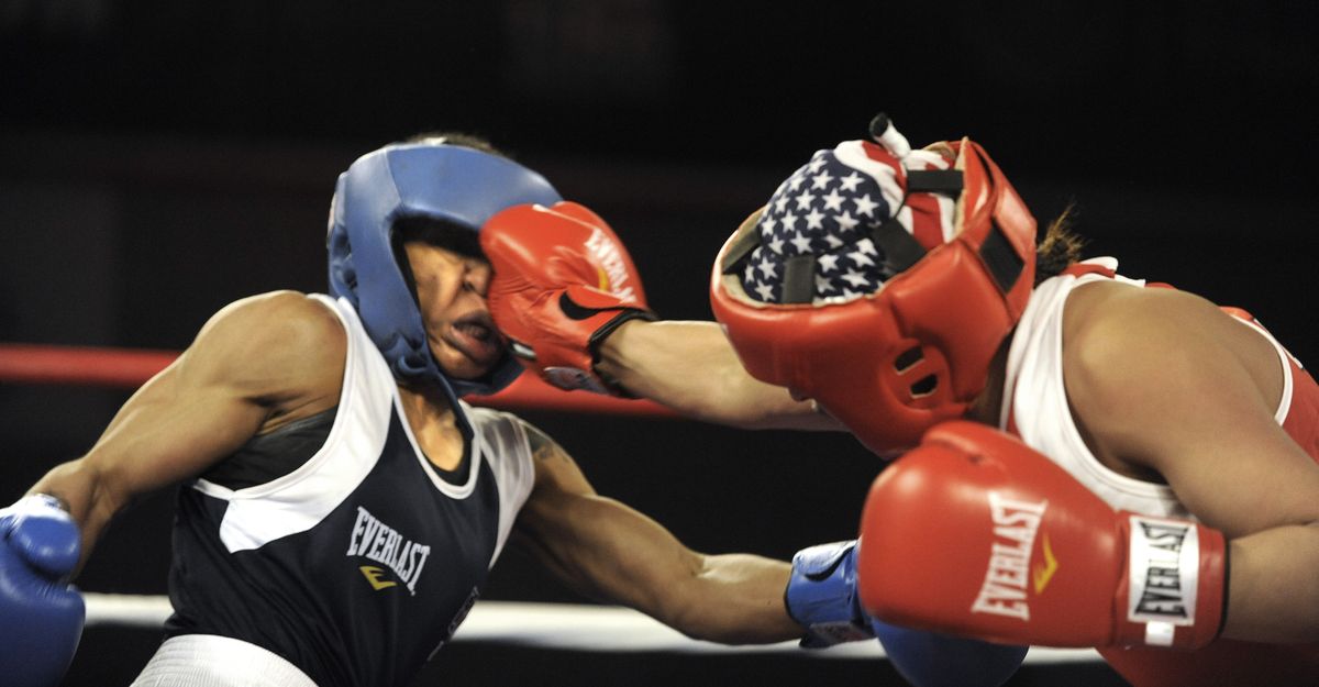 Marlen Esparza, right, tags her opponent, Tyrieshia Douglas, during their flyweight championship match. (Christopher Anderson)