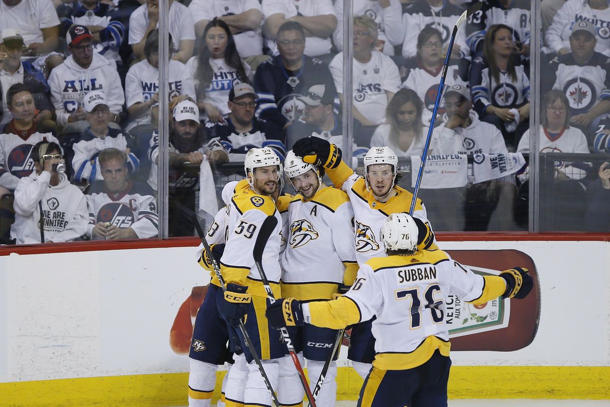 Nashville Predators’ Roman Josi (59), Viktor Arvidsson (33), Filip Forsberg (9), Ryan Johansen (92) and P.K. Subban (76) celebrate Forsberg’s goal against the Winnipeg Jets during the third period of an NHL playoff hockey game, Monday, May 7, 2018, in Winnipeg, Manitoba. The Nashville Predators beat the Winnipeg Jets 4-0, forcing a decisive Game 7 in their Western Conference semifinal series. (John Woods / Canadian Press via AP)