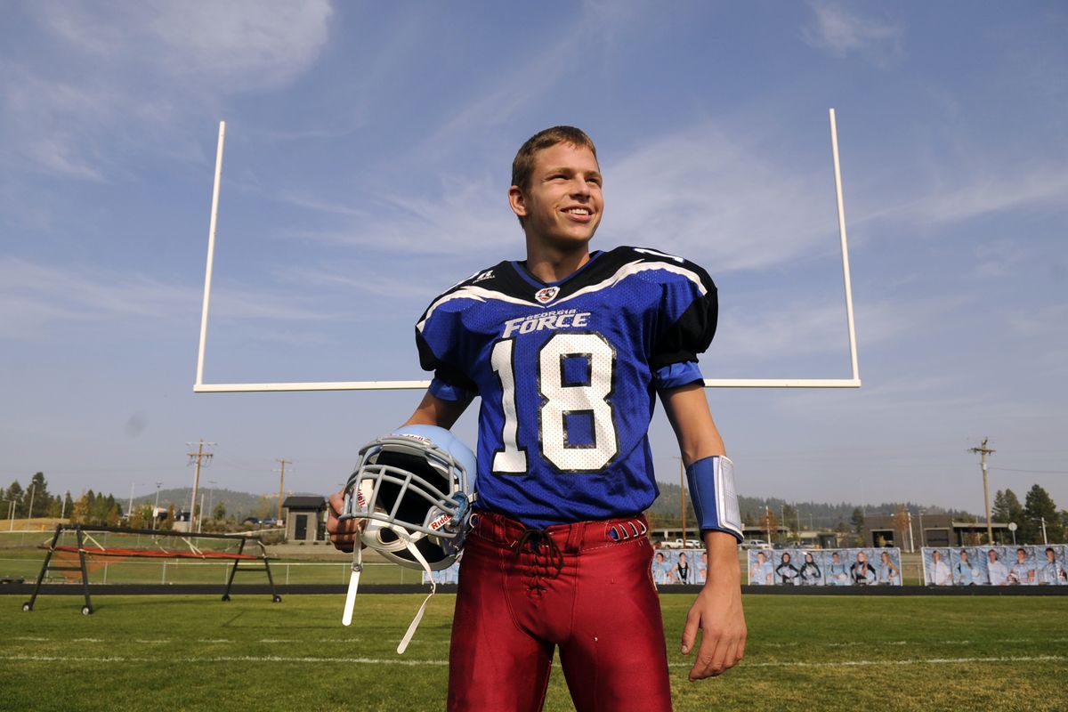 Senior Wyatt Smith, quarterback for the Freeman Scotties, stands on the field Tuesday, near Rockford. (Jesse Tinsley)