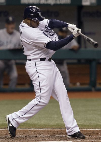 Tampa Bay Rays' Willy Aybar lines an RBI single off Seattle Mariners starter Jason Vargas. (Associated Press)