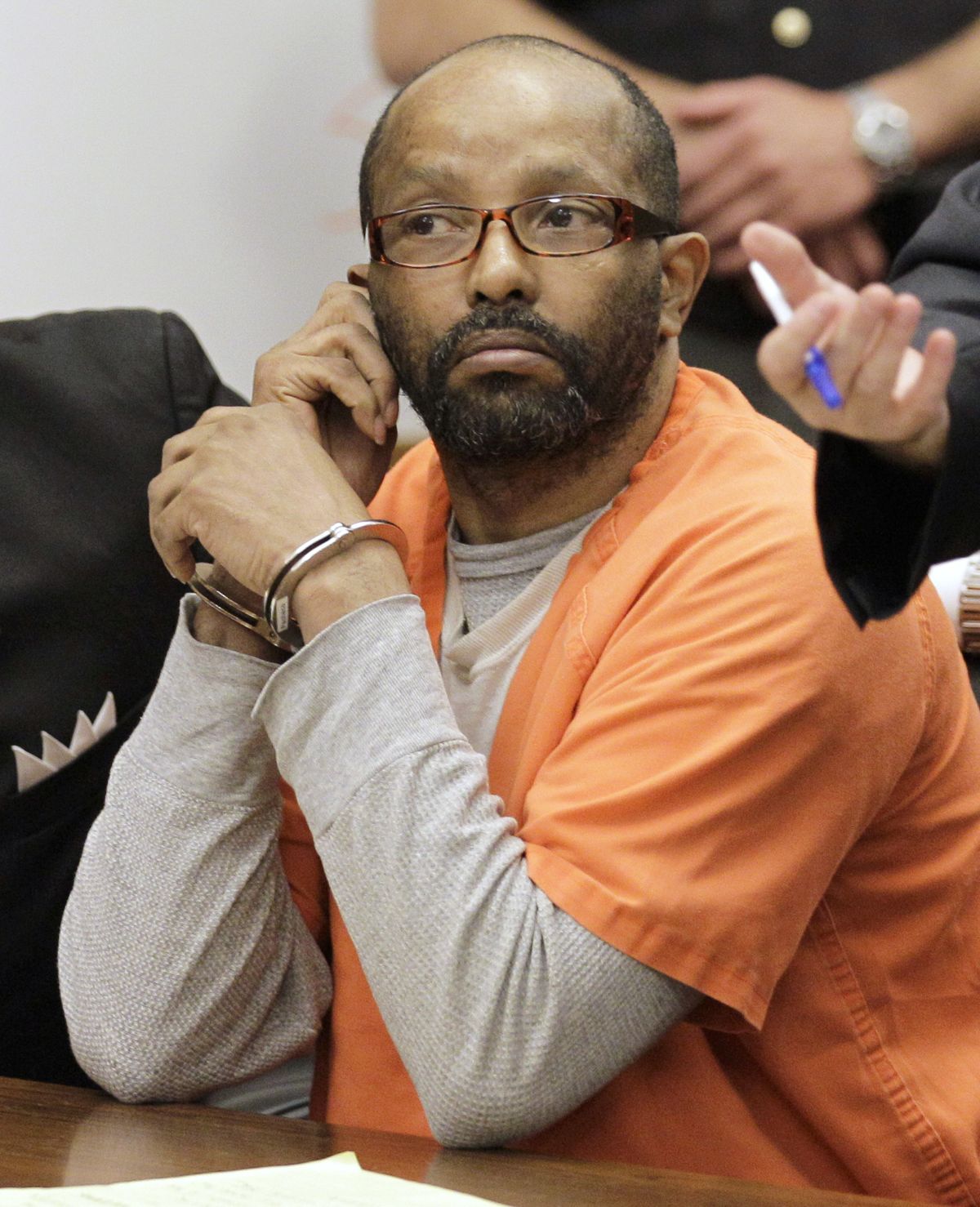 In this May 10, 2011 photo, Anthony Sowell appears in court in Cleveland. Sowell, an Ohio man sentenced to death for killing 11 women and hiding their remains in and around his home has died in prison. The state Corrections Department says the 61-year-old convicted serial killer was receiving end-of-life care at Franklin Medical Center for a terminal illness when he died Monday, Feb. 8, 2021.  (Amy Sancetta)