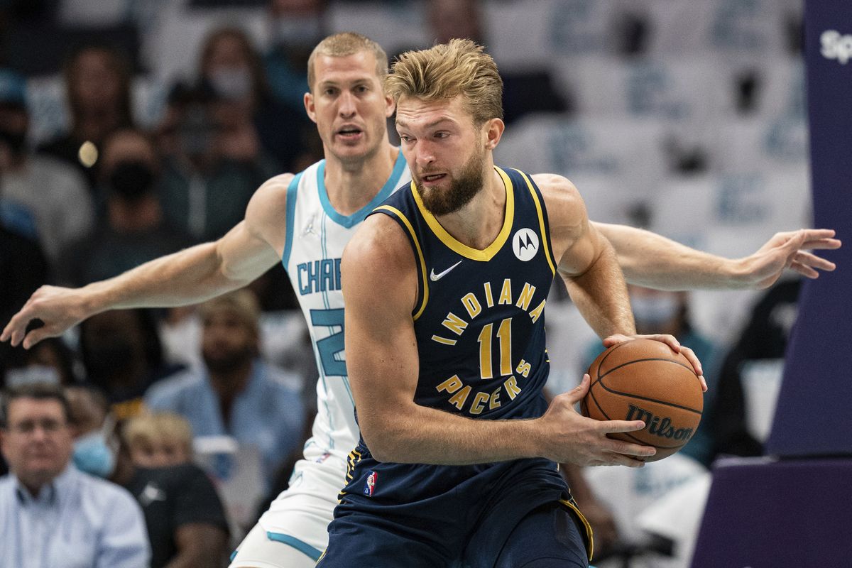 Indiana Pacers forward Domantas Sabonis (11) is guarded by Charlotte Hornets center Mason Plumlee (24) during the first half of an NBA basketball game in Charlotte, N.C., Wednesday, Oct. 20, 2021.  (Associated Press)