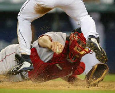 
Boston catcher Doug Mirabelli reaches to tag out Seattle's Ichiro Suzuki in the fourth inning.
 (Associated Press / The Spokesman-Review)