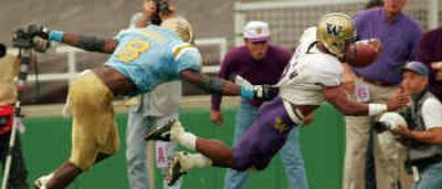
Ex-tailback Napoleon Kaufman, right, will be inducted into the UW Hall of Fame. Ex-tailback Napoleon Kaufman, right, will be inducted into the UW Hall of Fame. 
 (Associated PressAssociated Press / The Spokesman-Review)