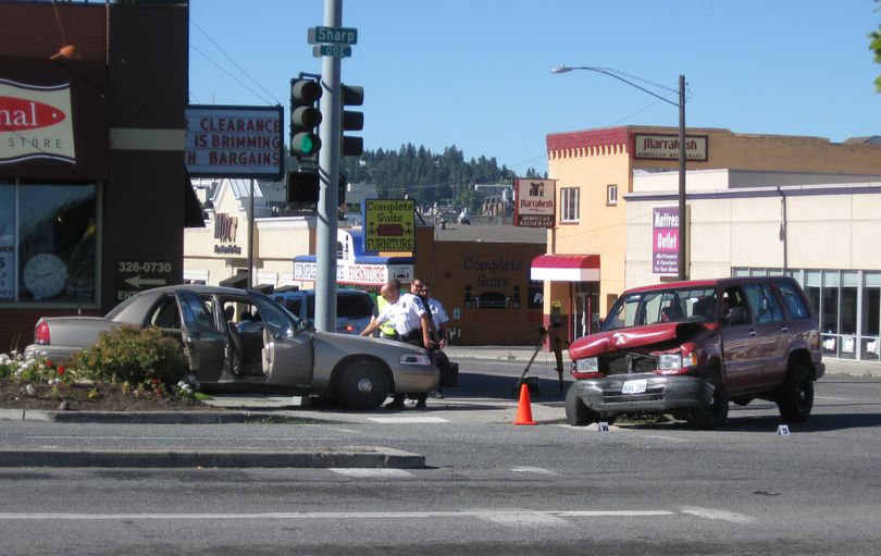 Tonia S. Vansant, 38, was convicted of three counts of vehicular assault for this July 16 crash at Division Street and Sharp Avenue. Three Spokane police detectives were injured. (Mike Prager / The Spokesman-Review)