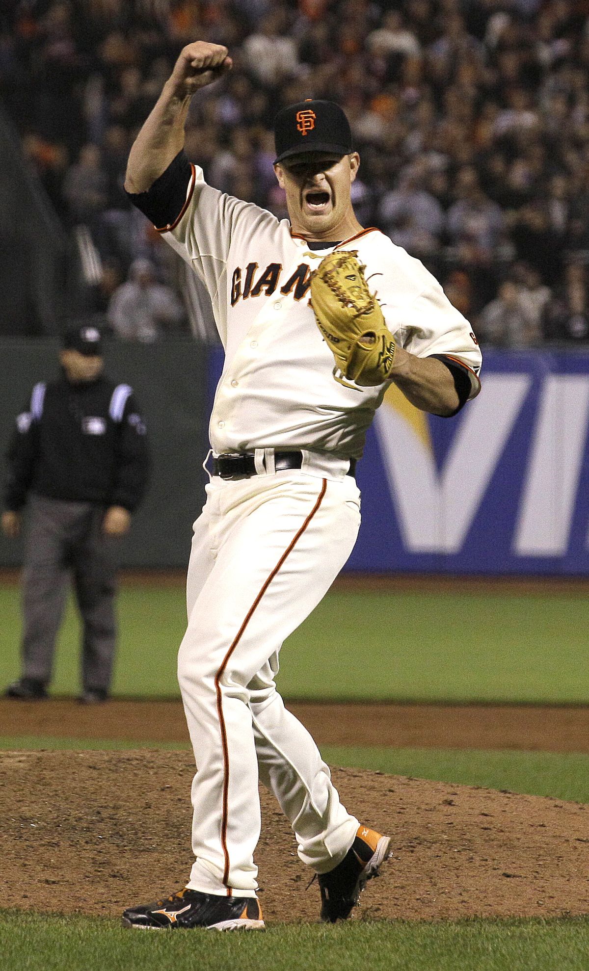 Giants’ Matt Cain celebrates after final out in ninth inning. (Associated Press)