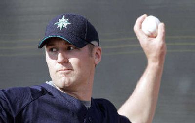 
Seattle Mariners pitcher Ryan Feierabend throws at baseball spring training in Peoria, Ariz. 
 (Associated Press / The Spokesman-Review)