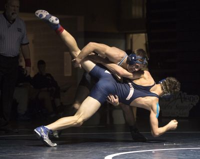 Central Valley’s Braedon Orrino takes down Mead’s Tristan Brooks in a 152-pound match, Dec. 17, 2015, at CV. Orrino won the match with an 18-5 major decision. (Dan Pelle / The Spokesman-Review)