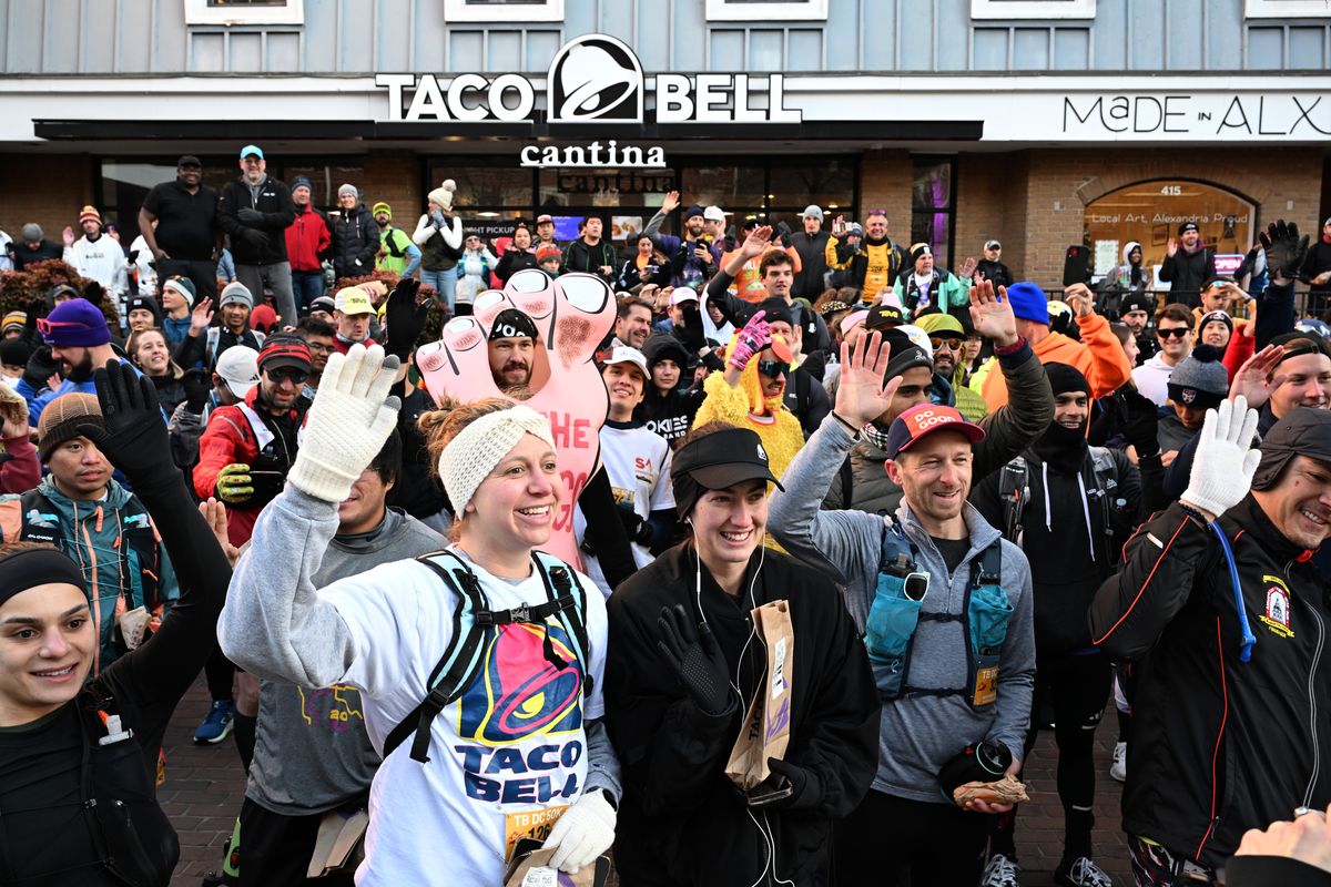 Hundreds gathered in Alexandria for the first-ever Taco Bell DC 50k on Saturday morning. MUST CREDIT: Marvin Joseph/The Washington Post  (Marvin Joseph/The Washington Post)