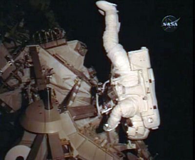 In this image from NASA TV, astronaut Stephen Bowen is seen during a spacewalk.   (Associated Press / The Spokesman-Review)