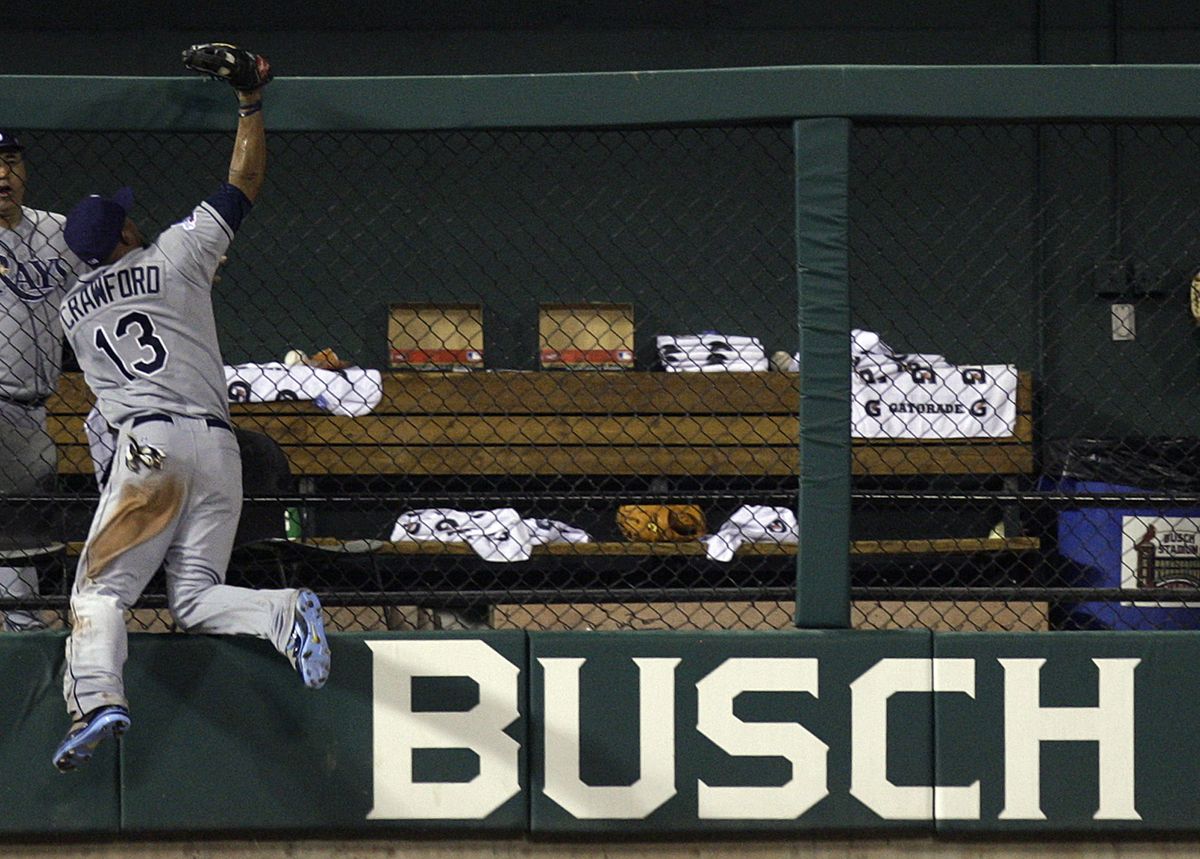 This catch by All-Star MVP Carl Crawford robbed Brad Hawpe of a home run and help the A.L. win their seventh straight Midsummer Classic.  (Associated Press / The Spokesman-Review)