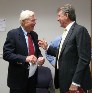 Idaho Gov. Butch Otter, right, congratulates Harold "Red" Thomas, co-founder of Trus Joist International, on the launch of a new firm, RedBuilt, launched Wednesday by a group of former Trus Joist executives who purchased the commercial division of Trus Joist back from Weyerhauser, which bought Trus Joist in 2000. RedBuilt will be headquartered in Boise. (Betsy Russell / The Spokesman-Review)