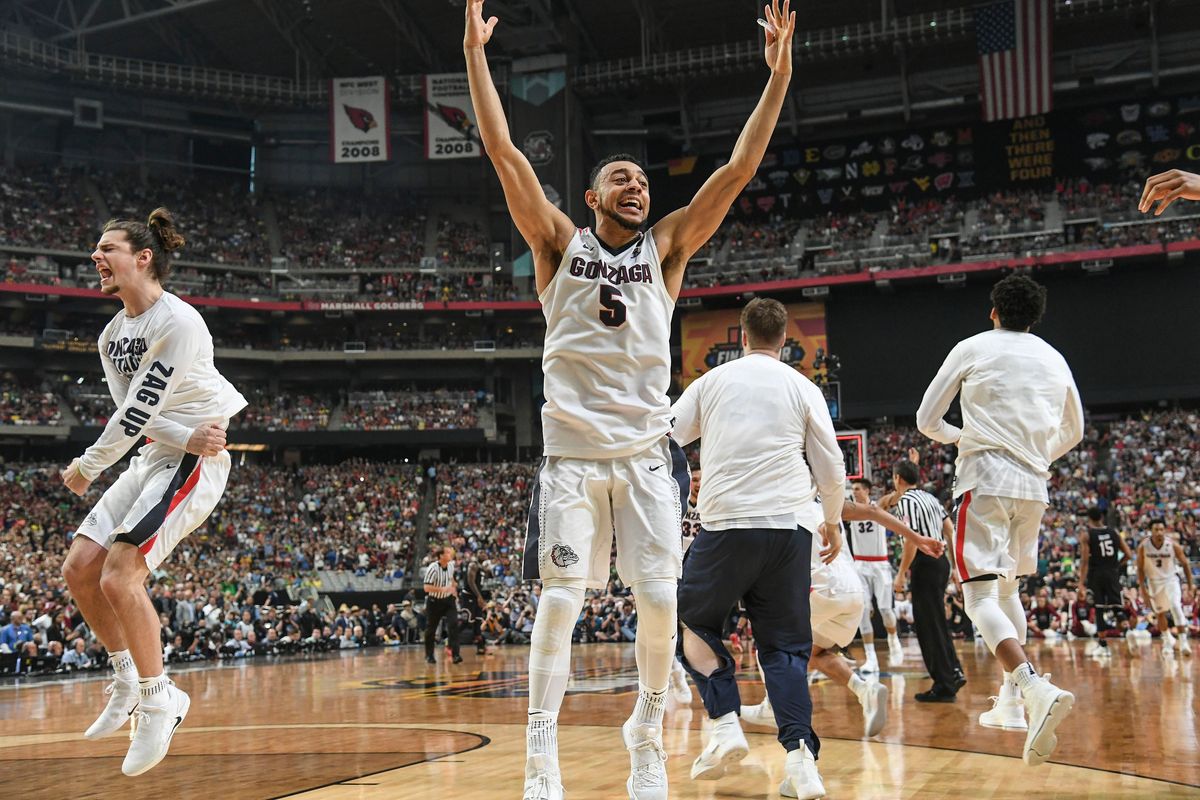 Gonzaga’s Nigel Williams-Goss (5) and Rem Bakamus (left) celebrate a win over South Carolina in the 2017 Final Four in Glendale, Arizona.  (Dan Pelle/The Spokesman-Review)