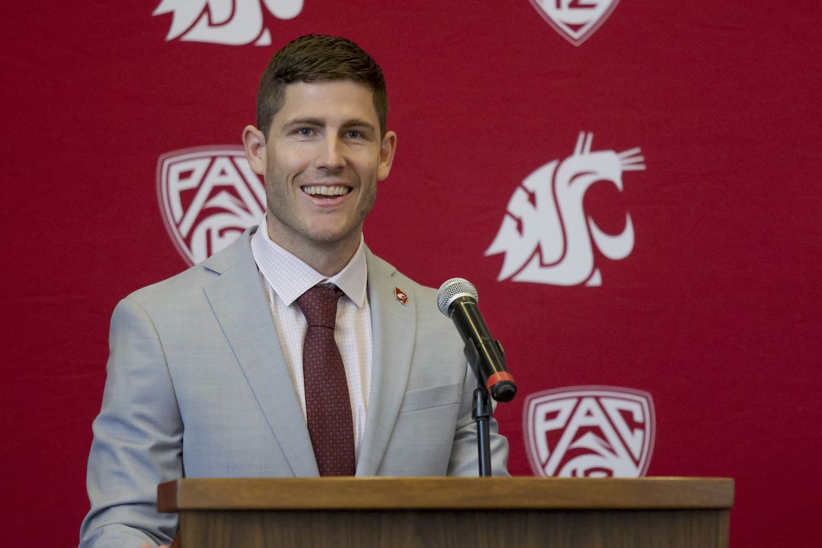 Kirby Moore speaks at a press conference after he was introduced as Washington State University