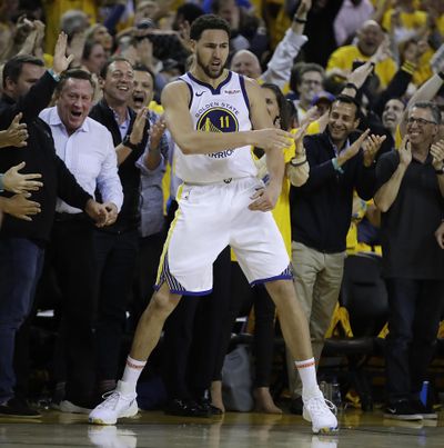 Golden State Warriors’ Klay Thompson celebrates in front of fans during the second half of Game 5 of the team’s second-round NBA basketball playoff series against the Houston Rockets on Wednesday, May 8, 2019, in Oakland, Calif. (Ben Margot / Associated Press)