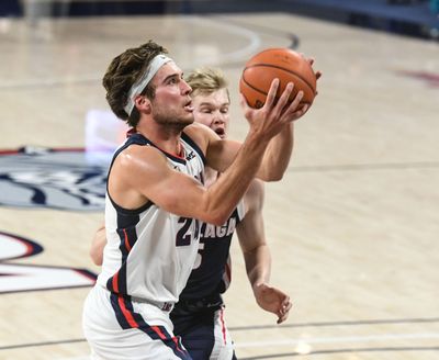 Gonzaga guard Corey Kispert drives to the basket against Martynas Arlauskas during Kraziness in the Kennel on Nov. 12.  (By Dan Pelle / The Spokesman-Review)