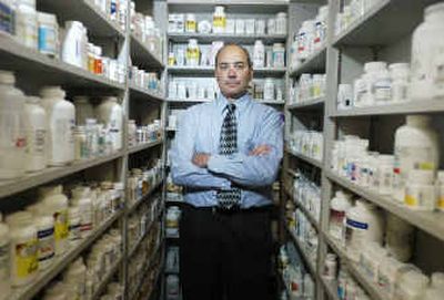 
Paul Tirotto, of Philadelphia, owns two pharmacies and says his business makes money based on volume as the profit per prescription varies. 
 (Knight Ridder Tribune / The Spokesman-Review)