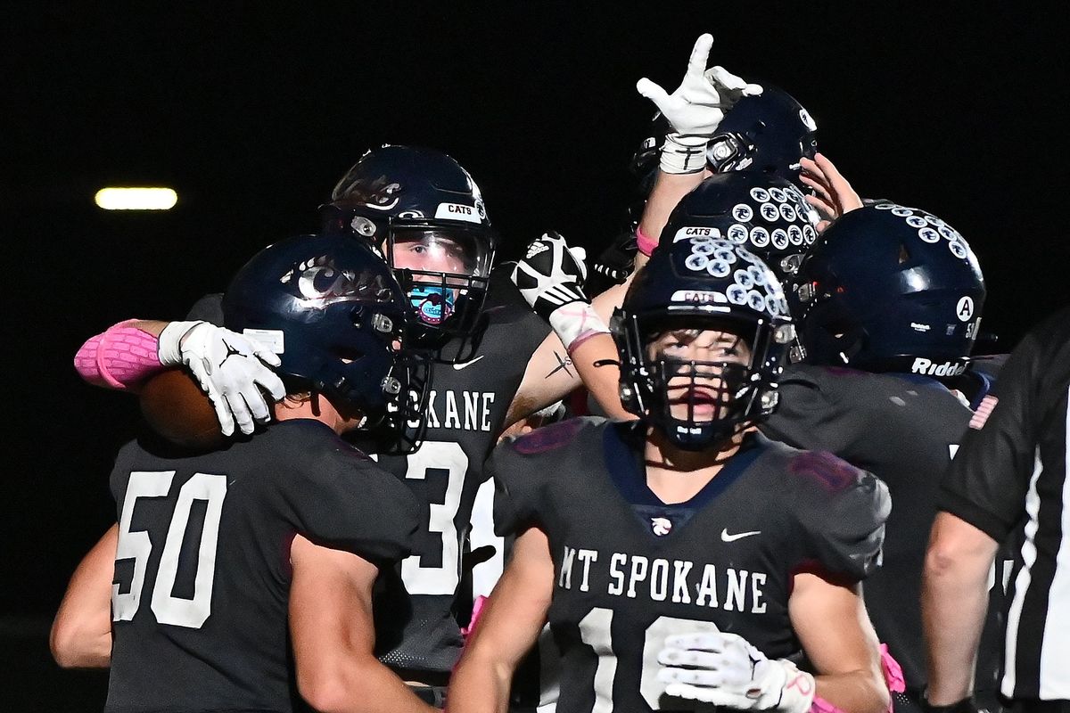 Mt. Spokane wide receiver Ethan Keene, second from left, celebrates a touchdown in overtime against Central Valley during Friday’s GSL play.  (James Snook/FOR THE SPOKESMAN-REVIEW)