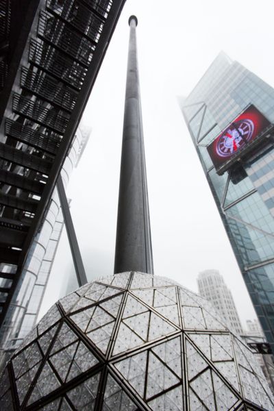 The Waterford crystal ball sits atop One Times Square on Sunday before being raised up the flagpole in preparation for New Year’s Eve. (Mark Lennihan / Associated Press)
