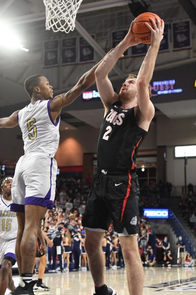Gonzaga’s Drew Timme operates in the paint against Alcorn State’s Keondre Montgomery in Monday’s 84-57 home win.  (Jesse Tinsley/The Spokesman-Review)