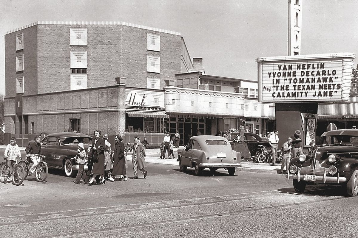 The Garland Theater opened to the public on Thanksgiving Day, 1945. This theater could seat over 900 people and was one of the most modernized theaters in Spokane at the time.  In 1954, widescreens, stereophonic sound equipment, new seats and curtains were installed, at a cost of $20,000.  In November 1959, the theater was purchased from the original owner by Edward H. Metzger for his $200,000. Metzger sold the theater in 1961 after a legal dispute with his former owner.  When the Garland Theater opened in 1945, it received congratulatory telegrams from Bing Crosby, Cary Grant, and Bob Hope. Its stylish interior, lobby record and gift shop, and nearly 1,000 seats made it a big hit at the end of World War II.  By the 1960s, it had lost its glamor and closed, opening and closing sporadically over the next two decades.  Opened in the late 1980s as the Discount His Theater, the idea caught on and he still shows his second movie on Wednesday nights for a $1 admission fee. Owner Kathy Fritsch recently added a trendy bar, Bon Bon, to the attached building.  (Spokesman Review Photo Archive)