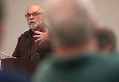 
North Idaho College instructor Ken Lustig talks about the effect of the refueling depot over the aquifer Wednesday at NIC. 
 (Brian Plonka / The Spokesman-Review)