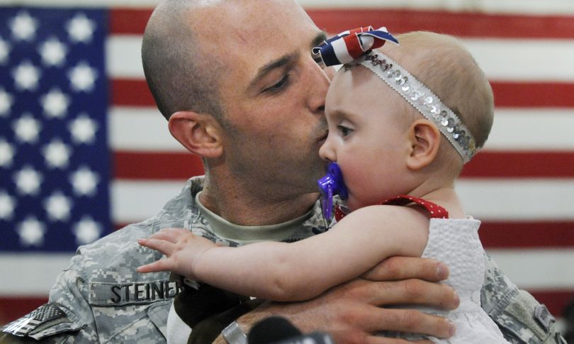 Capt. Corey Steiner is welcomed home by his daughter, Lilliana Steiner, during a homecoming ceremony, Friday, Oct. 21, 2011 at Ft. Carson, Colo. All U.S. troops 