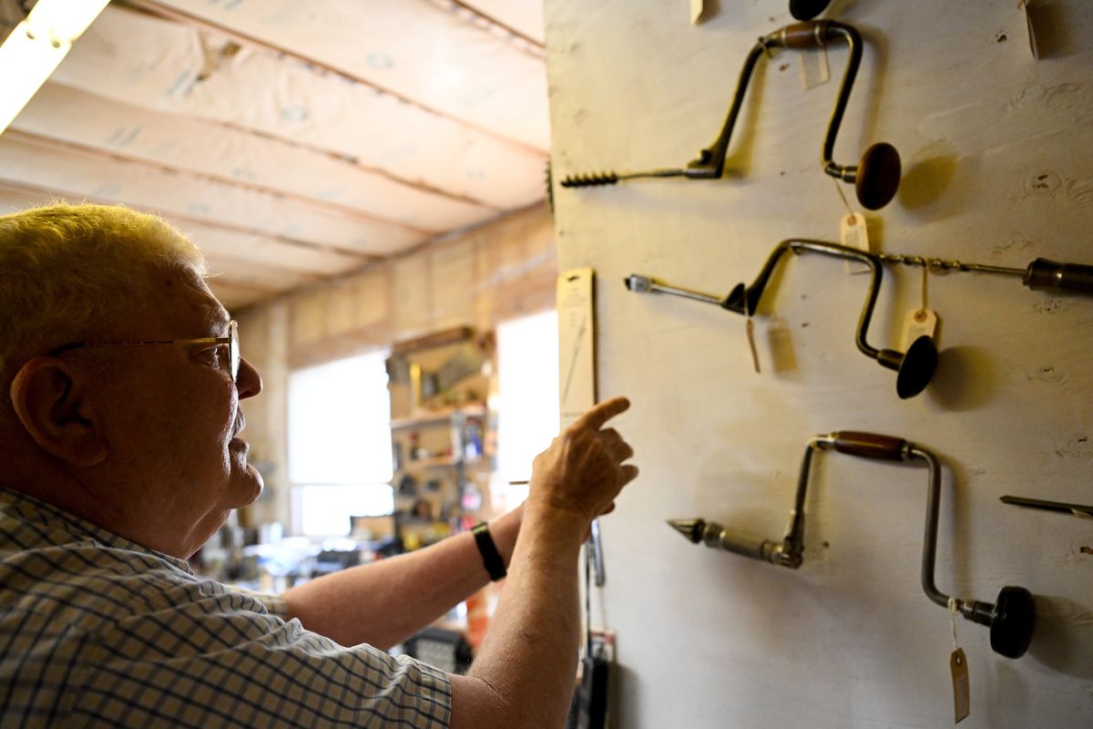 Harold Young shows off his collection of vintage tools on Tuesday at his home shop in Spokane.  (Tyler Tjomsland/The Spokesman-Review)