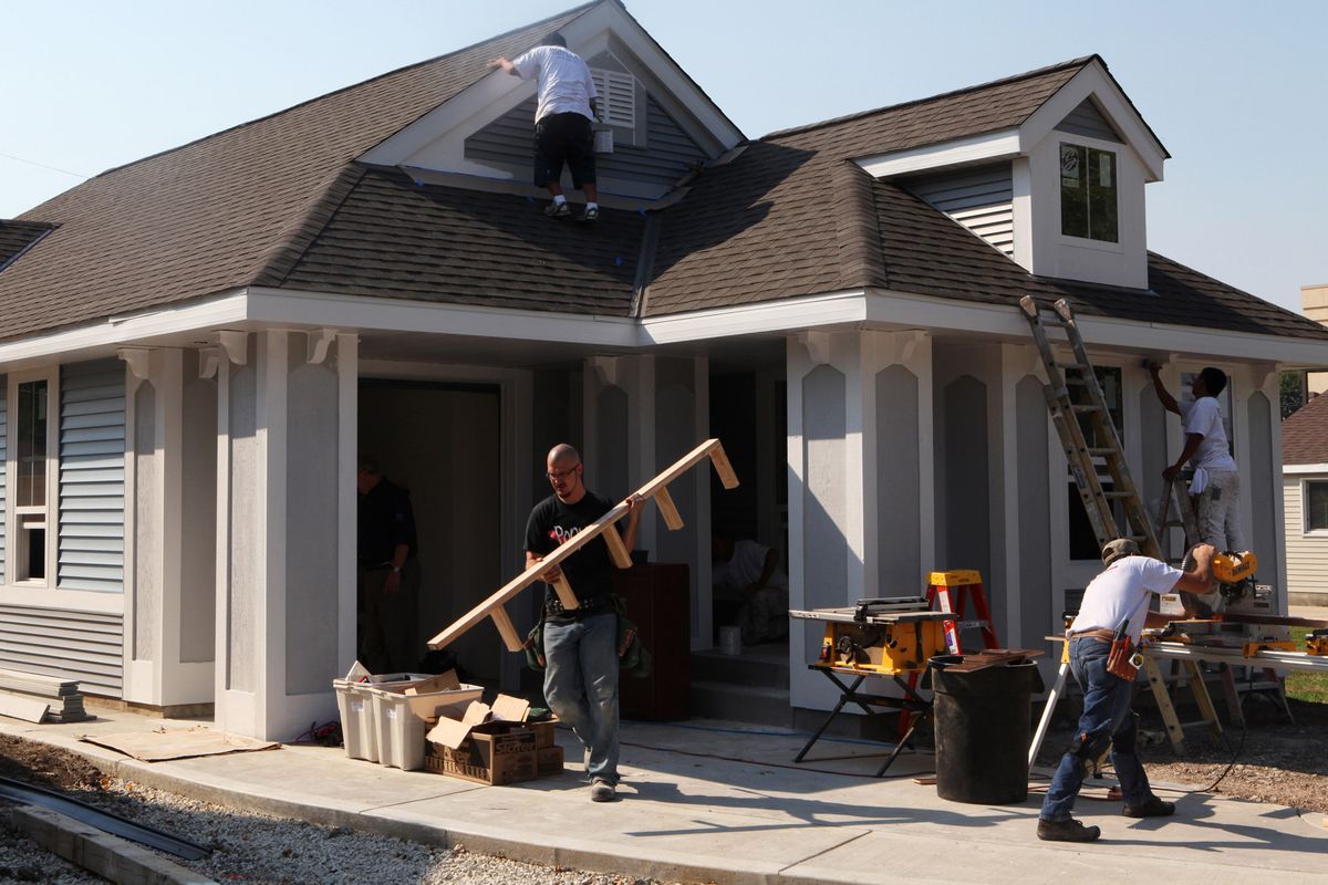 Miracle Homes is developing tiny, 1,000-square-foot homes that make the most of cruise-ship designs, allowing owners to cram a lot of stuff into little space. Here, construction workers put together a ranch-style home.