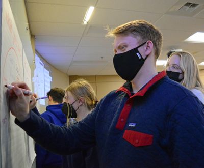 Gonzaga University student Aidan McCarthy, a member of the men’s rowing team, joins other students in participating in an exercise during a Personal Branding for Athletes class in February 2022.  (Greg Mason / The Spokesman-Review)