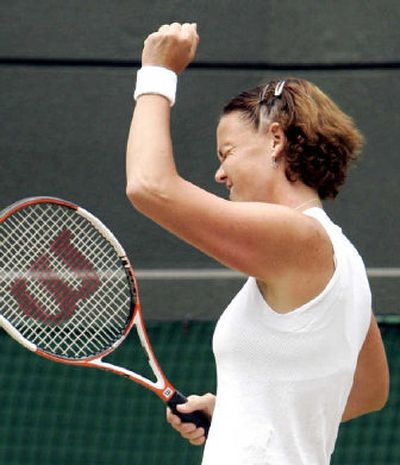 
Lindsay Davenport smiles after her  win over Amelie Mauresmo in their semifinal match on Centre Court at Wimbledon.
 (Associated Press / The Spokesman-Review)