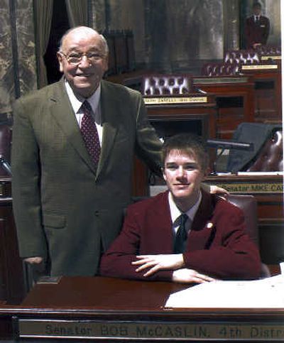 Sen. Bob McCaslin poses for a photo with page Josh Isbey.Courtesy of family
 (Courtesy of family / The Spokesman-Review)