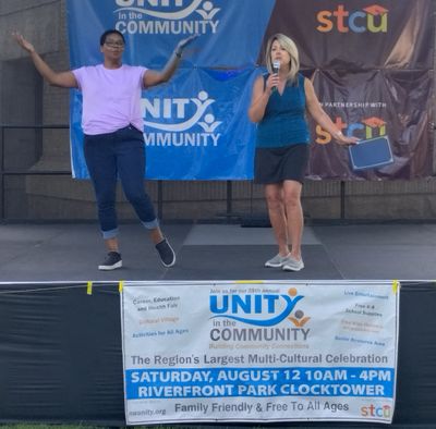 Spokane Mayor Nadine Woodward, right, and Spokane City Council member Betsy Wilkerson celebrate the annual Unity in the Community festival on Saturday in Riverfront Park.  (Amanda Sullender/The Spokesman-Review)