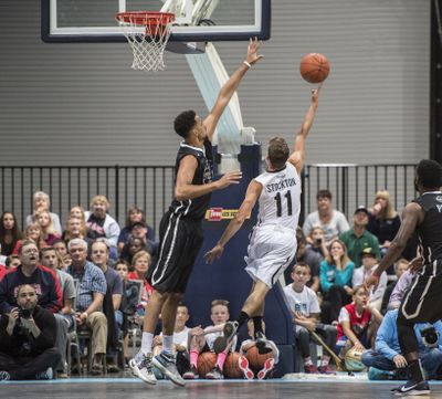 Former Zag forward Austin Daye challenges David Stockton’s shot during a GU alumni game in 2016. (Dan Pelle / The Spokesman-Review)