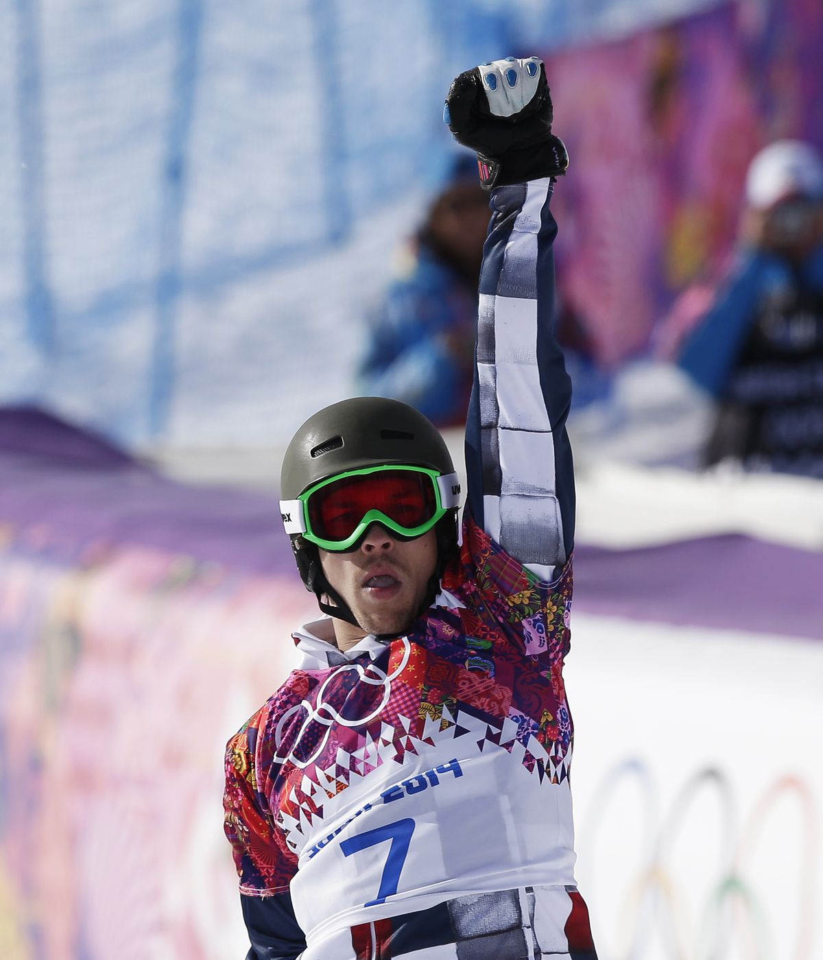 Russia’s Vic Wild, born and raised in White Salmon, Wash., celebrates his gold medal Wednesday. (Associated Press)