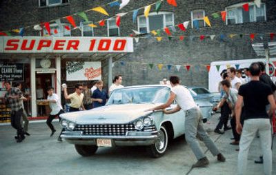 
A group of white men attempt to attack two African Americans who briefly parked their car outside a Chicago gas station in August 1966. They were able to flee and police made several arrests. 
 (PHOTOs BY BERNARD KLEIRA / The Spokesman-Review)