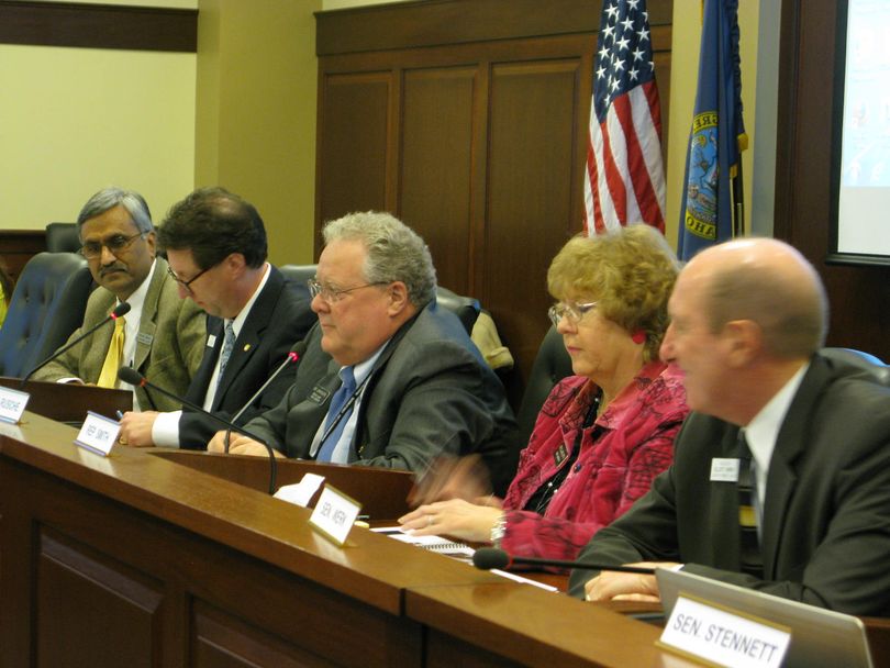Members of the Idaho Legislature's Joint Legislative Oversight Committee receive a new report on 