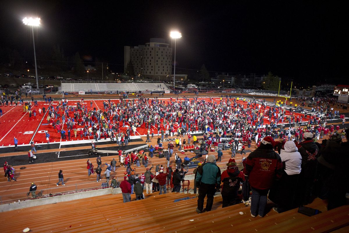 Fans storm Roos field after EWU's 41-31 win over Villonova University on Friday, Dec. 17, 2010, in Cheney, Wash . (Colin Mulvany / The Spokesman-Review)