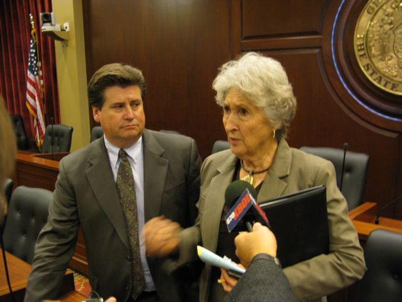Sen. Dean Cameron, left, and Rep. Maxine Bell, right, talk with reporters after an unprecedented four-hour public hearing Friday on school funding. Bell termed the hearing 'extremely successful.' (Betsy Russell)