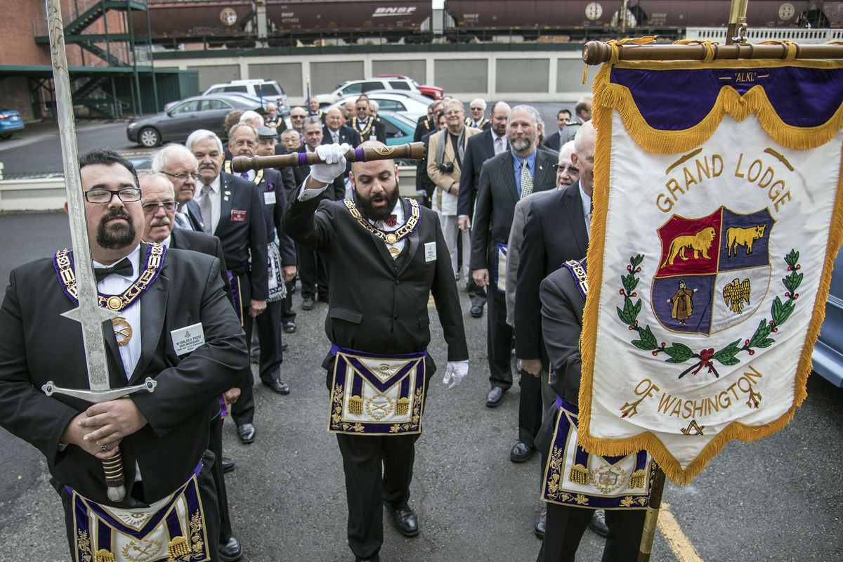 Freemasons Grand Lodge Grand Marshal Sam Ali gathers members for a procession into the Spokane Masonic Center’s new lodge on Oct. 22, 2106, in the Selkirk Building at Second Avenue and Stevens Street in downtown Spokane, Wash. (Dan Pelle / The Spokesman-Review)