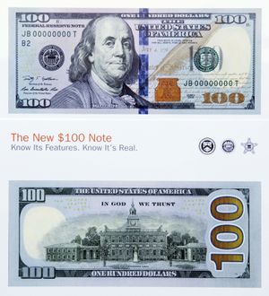 New design of the $100 bill is shown after it was unveiled at the Treasury Department in Washington, Wednesday, April 21, 2010. (Manuel Ceneta / Associated Press)