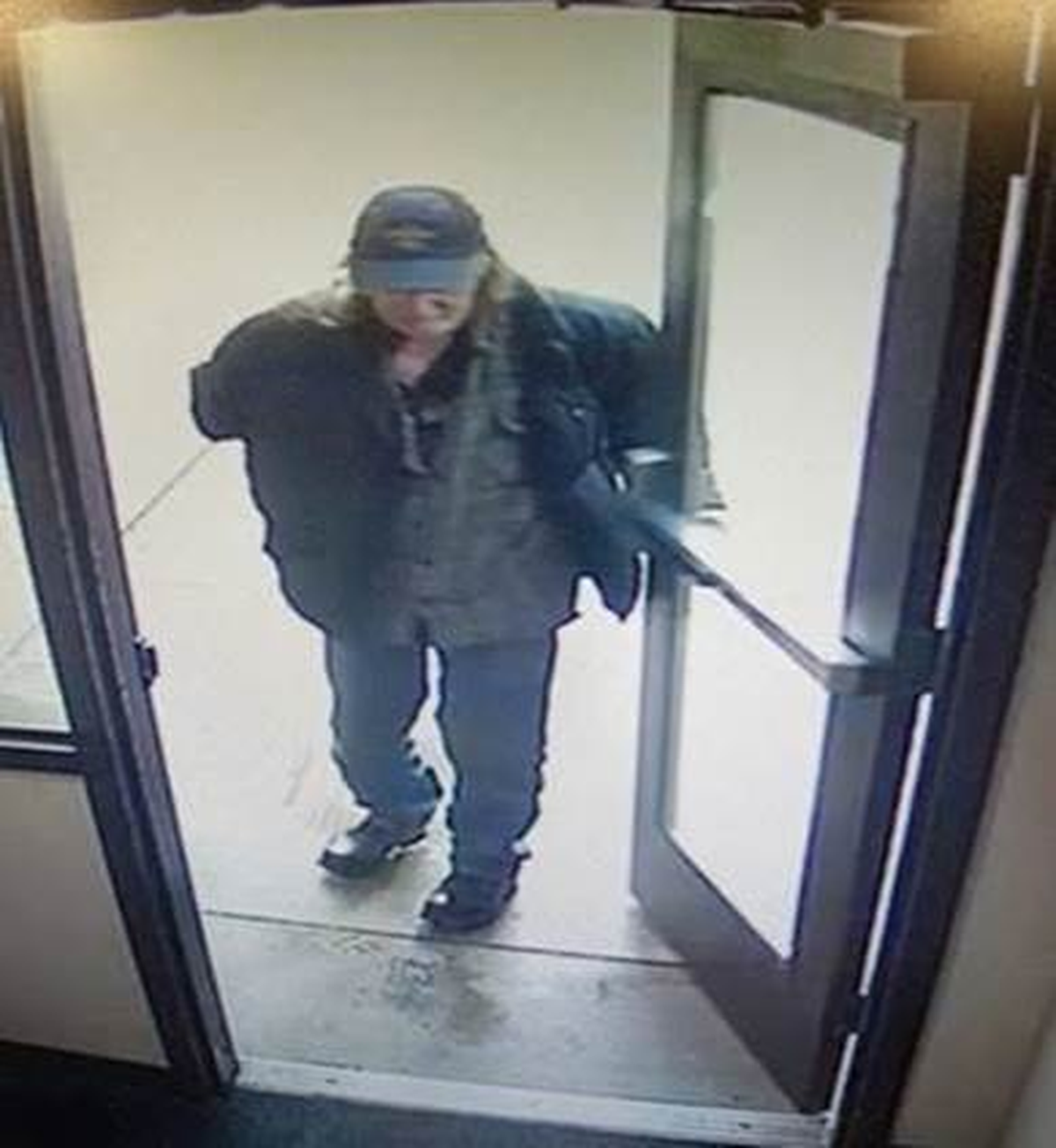 Spokane police is looking for this man it believes was involved in a hit-and-run that left a man seriously injured Thursday in the Logan Neighborhood.  (Courtesy of Spokane Police Department)