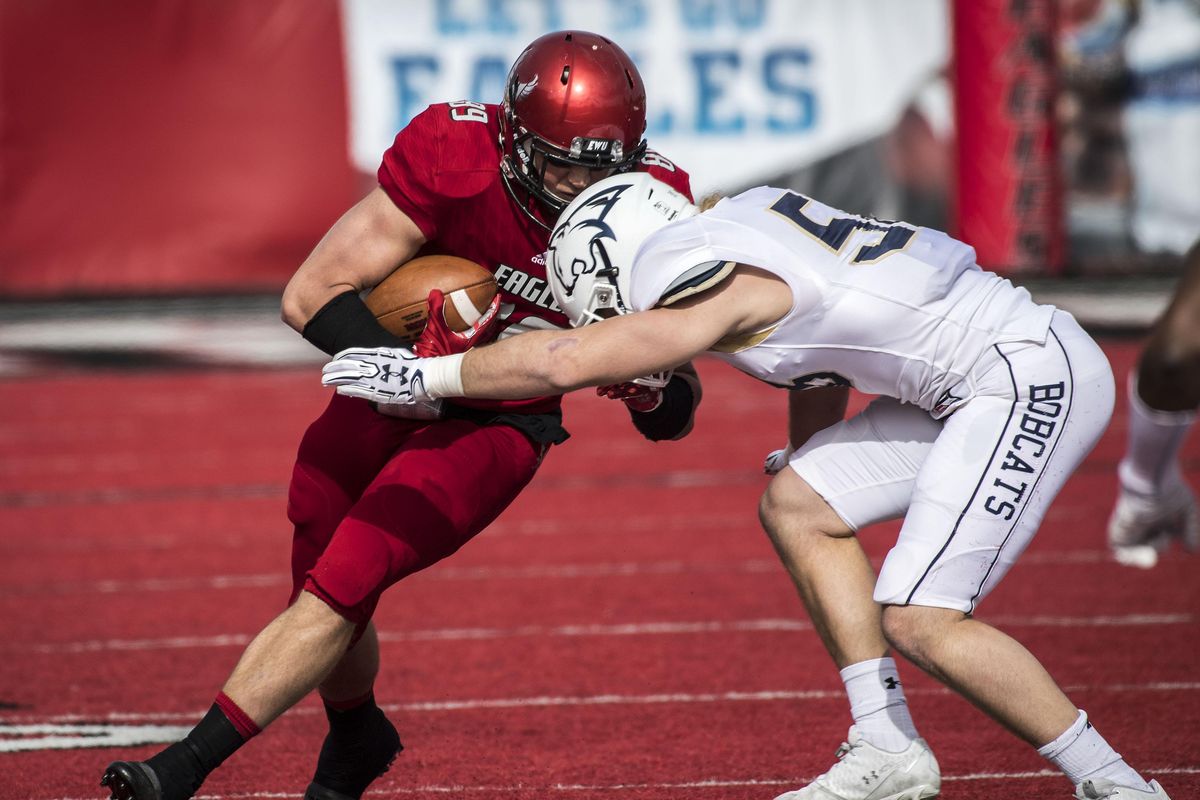Eastern Washington tight end Jayce Gilder  tries to get by Montana State linebacker Josh Hill  during the first half of a game on Oct. 14, 2017, in Cheney. (Colin Mulvany / The Spokesman-Review)