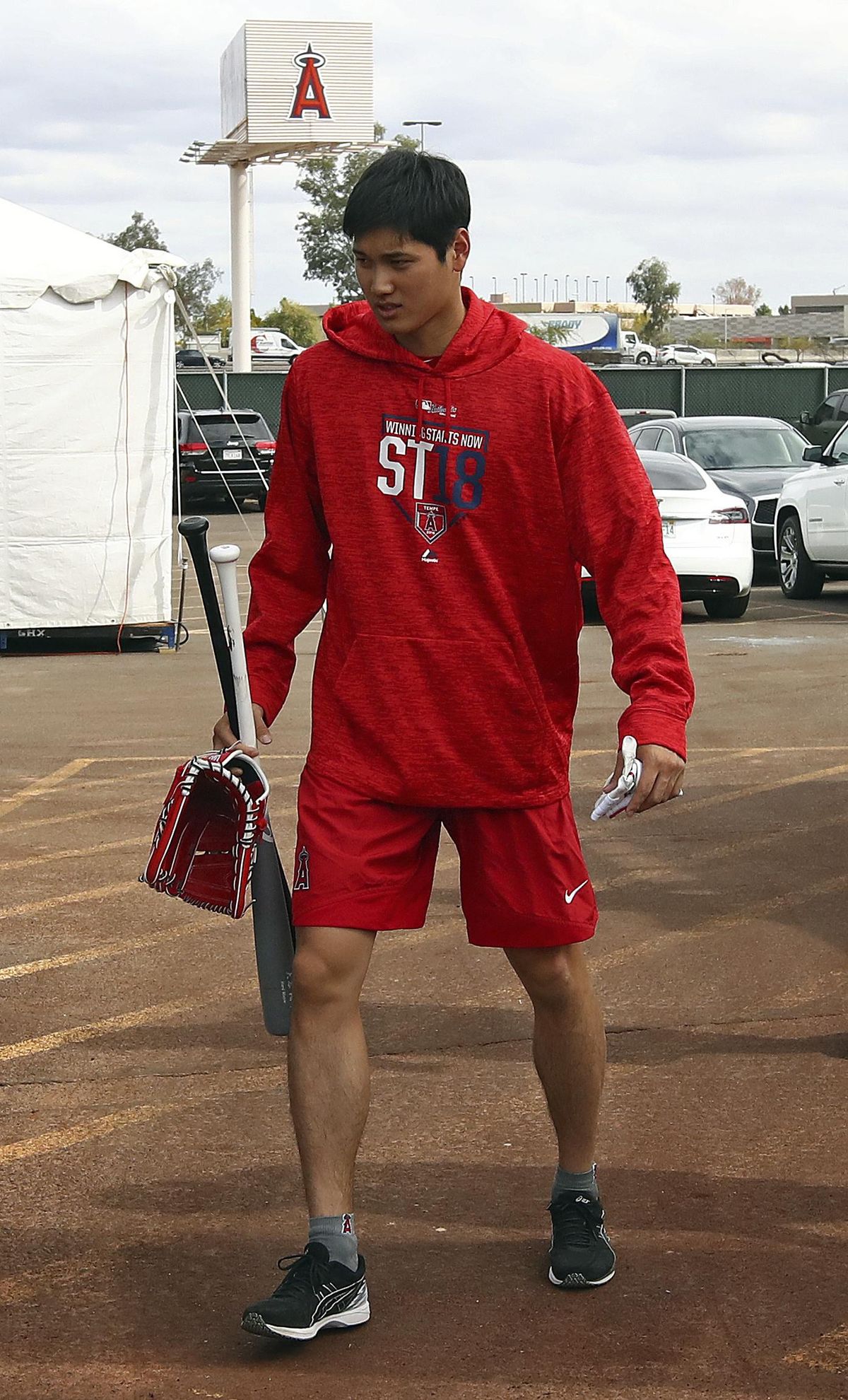 Los Angeles Angels’ Shohei Ohtani walks from the batting cage during a spring training baseball practice on Tuesday, Feb. 13, 2018, in Tempe, Ariz. (Ben Margot / Associated Press)