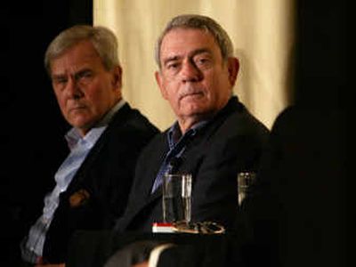 
CBS anchor Dan Rather, right, listens alongside NBC anchor Tom Brokaw, left, during a panel discussion Saturday in New York. 
 (Associated Press / The Spokesman-Review)