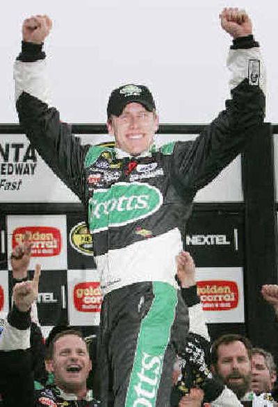 
Carl Edwards celebrates in victory lane after winning last week's NASCAR Nextel Cup Golden Corral 500. 
 (Associated Press / The Spokesman-Review)