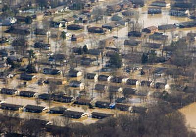 
A neighborhood in Poplar Bluff, Mo., sits under water Thursday  as floodwaters from the nearby Black River were slowly receding. Associated Press
 (Associated Press / The Spokesman-Review)