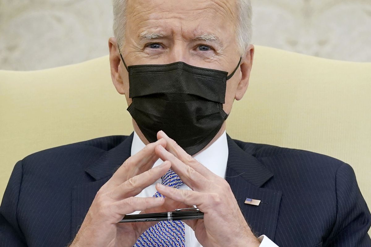 FILE - In this April 12, 2021, file photo President Joe Biden speaks during a meeting with lawmakers to discuss the American Jobs Plan in the Oval Office of the White House in Washington.  (Patrick Semansky)